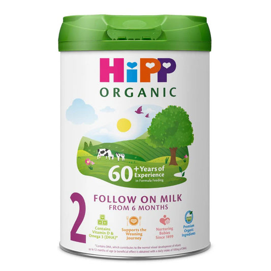 Hipp Organic Follow On Milk stage 2 container with green lid on a white background